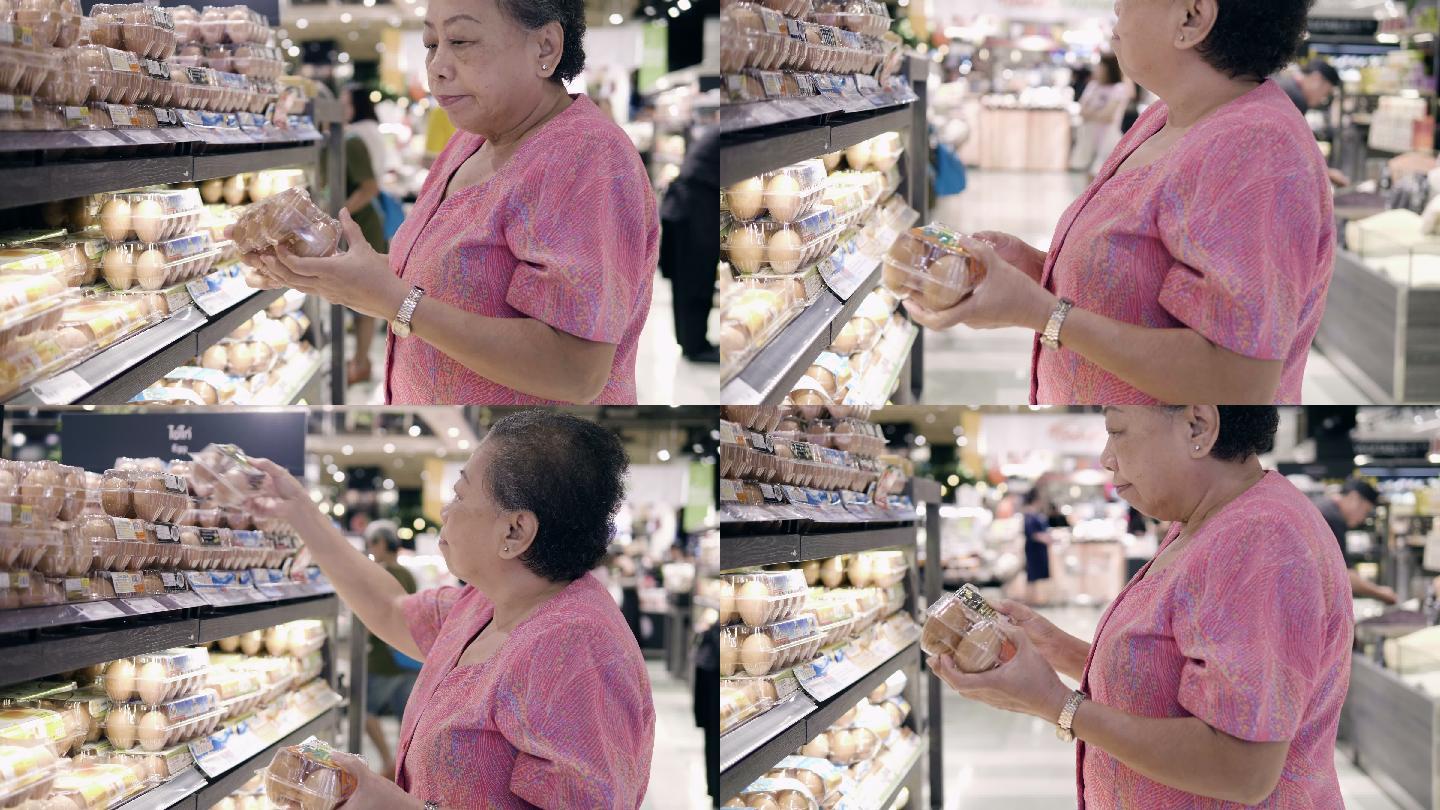 亚裔老人在超市捡鸡蛋