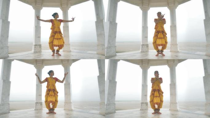 古典舞者在山顶上的寺庙中优雅跳舞