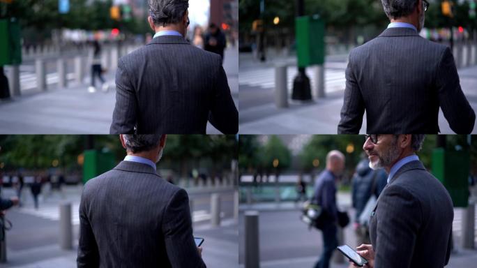 男性高管在户外使用手机沟通的慢动作效应