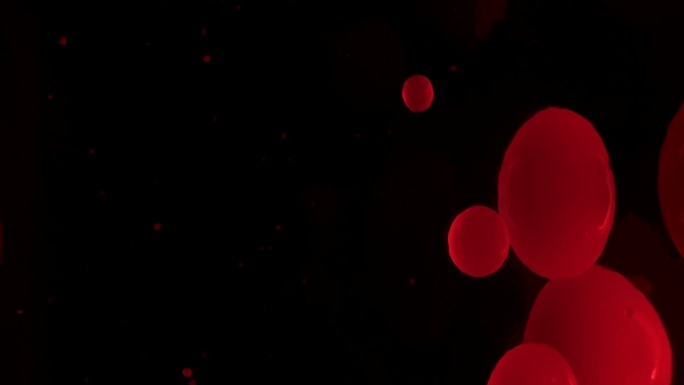 熔岩灯的红色气泡穿插融合球体碰撞动力学物