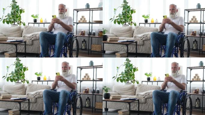 残疾老人坐在轮椅上使用手机