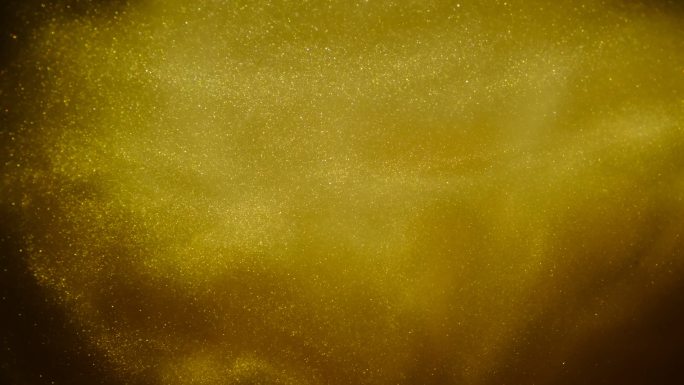 金黄色的沙子形成抽象的云层背景。
