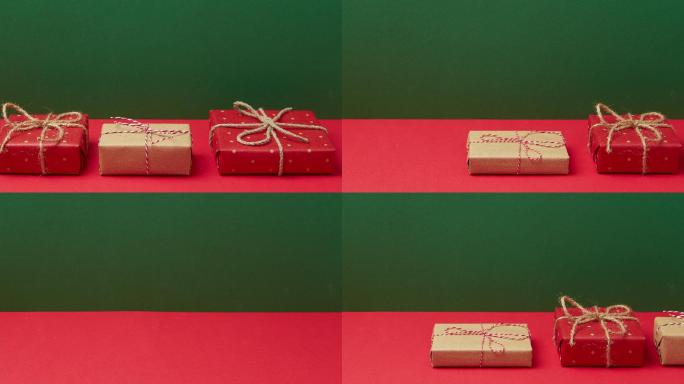 圣诞新年礼盒在红色背景上移动