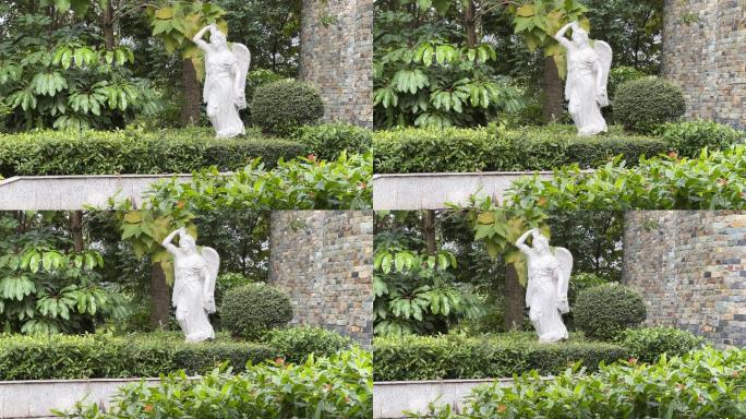 欧式城堡门口的成熟女性天使汉白玉石雕像