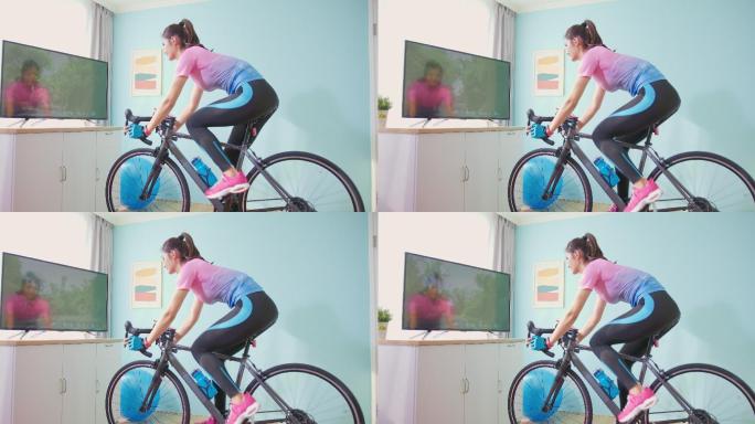 女子骑健身自行车运动健身骑行运动