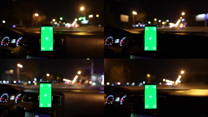 在夜间汽车驾驶背景上显示绿色屏幕