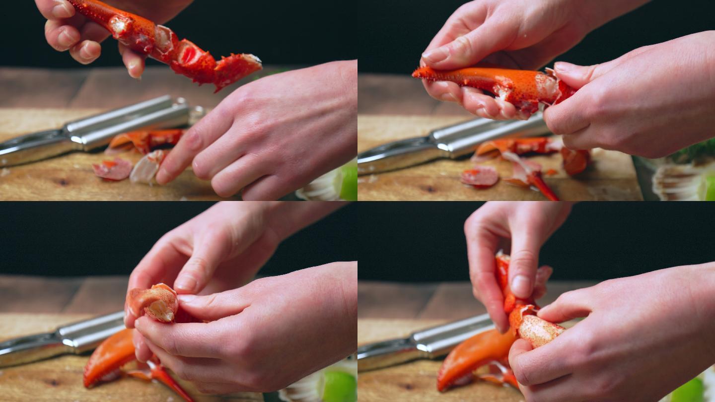 用海鲜工具打碎煮熟的红龙虾