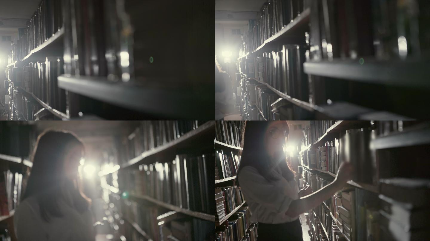 年轻女子晚上在图书馆书架上拿书