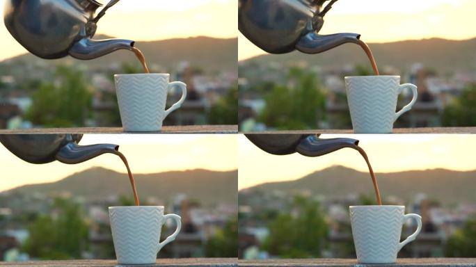 早晨日出时用茶壶倒茶