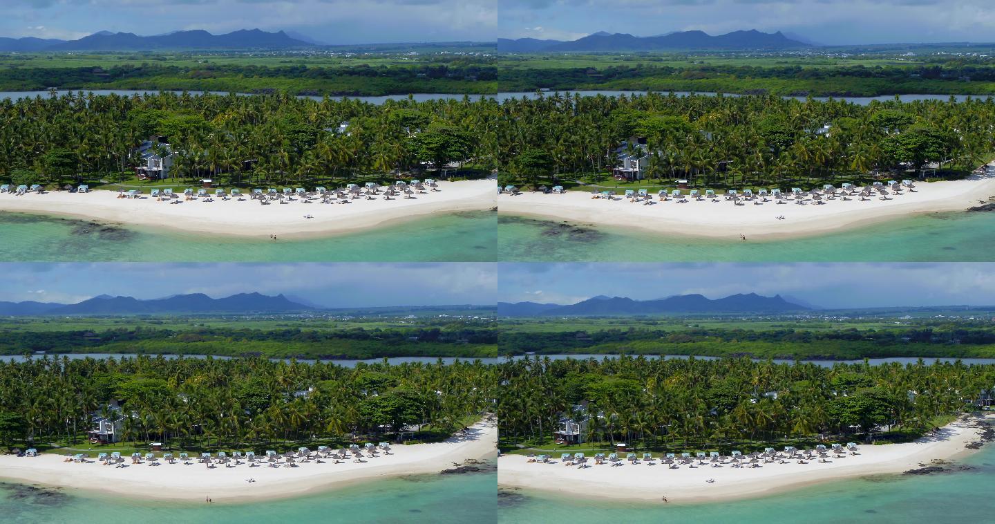 海边度假型酒店的白色沙滩及椰树林航拍素材