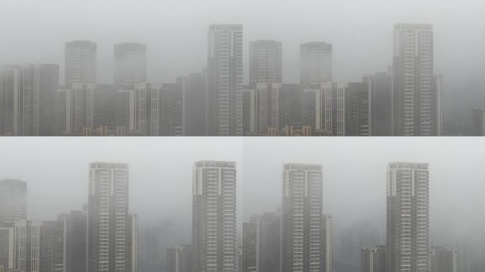 南方春天回南天超高层住宅楼宇烟雨若隐若现
