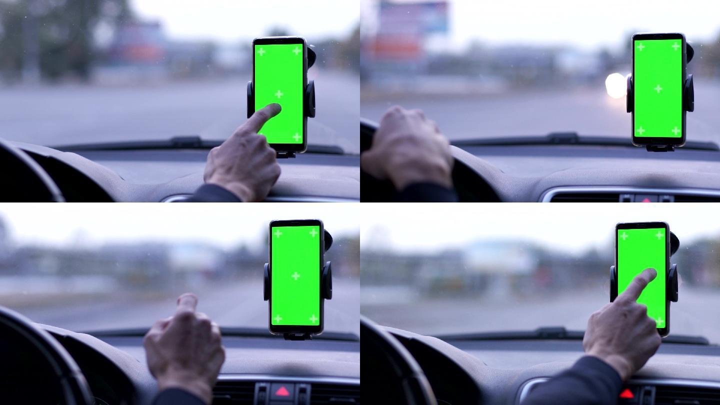 汽车仪表板绿色屏幕上的手机