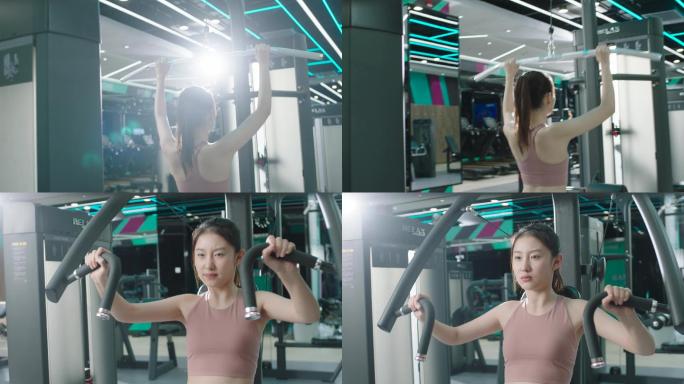 女人在健身房使用健身器材4k