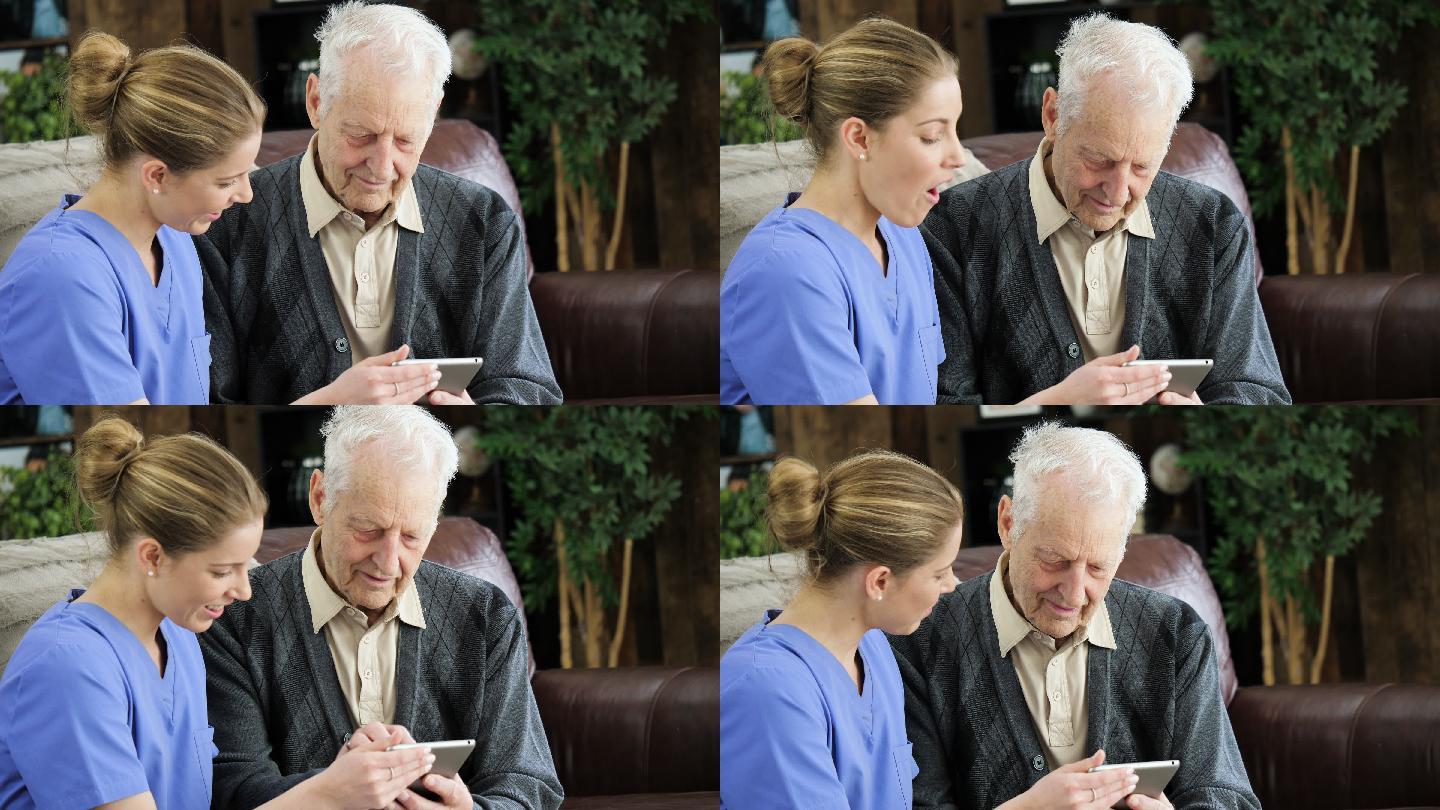 护士向一名老年男子展示他的体检结果。