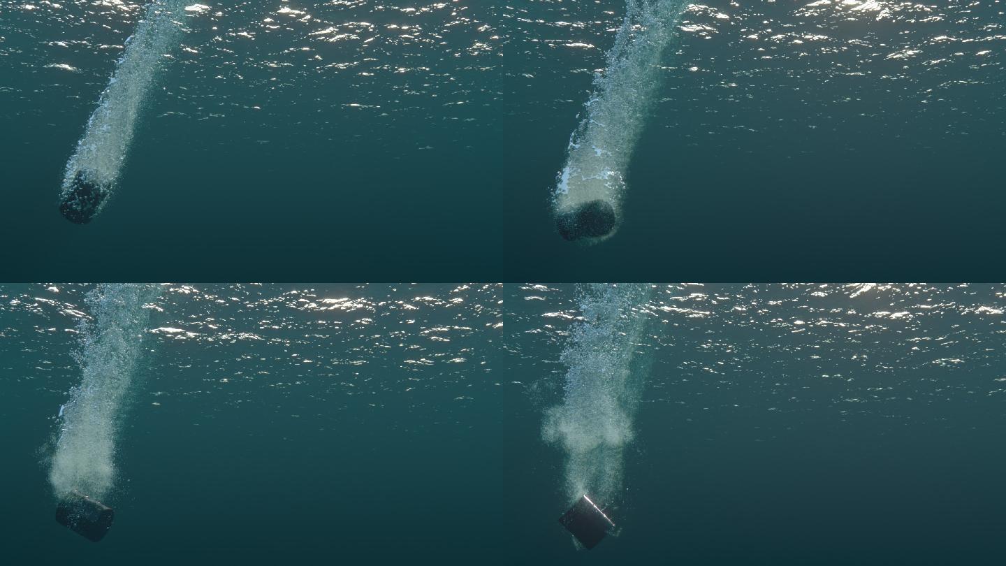 一个桶被扔进海里的水下视图。
