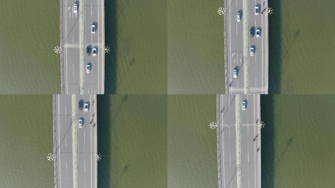 4K航拍大桥上汽车行驶的场景