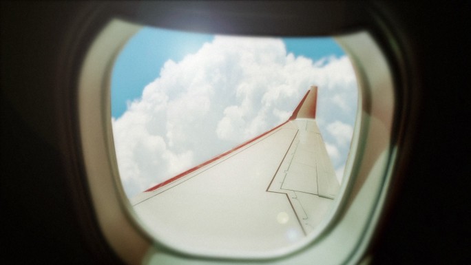 飞机窗口视图窗外机舱蓝天白云民航客机