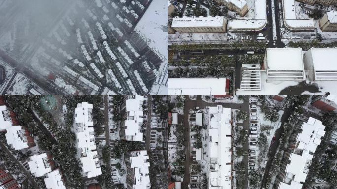 航拍中国城市小区雪景，城区雪景航拍素材