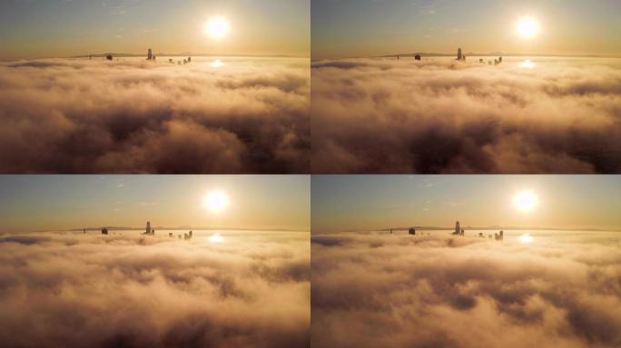 在加利福尼亚旧金山晨曦中飞过云层。
