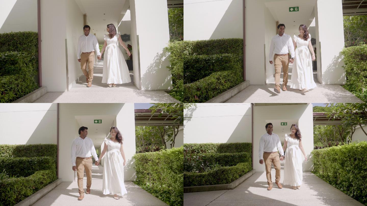 走廊上行走的夫妇结婚婚礼外景拍摄