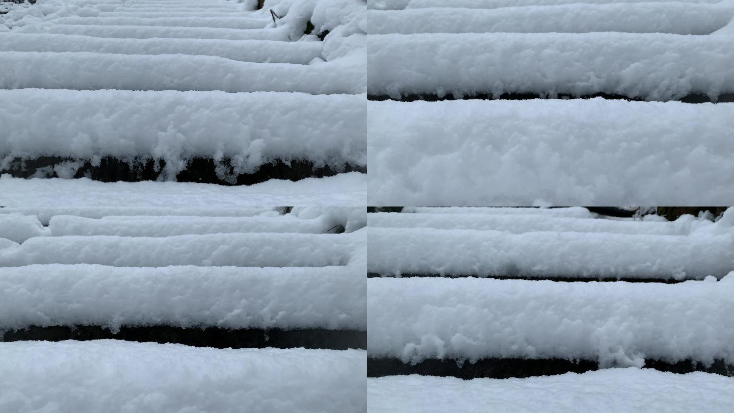 雪天爬山寺台阶爬台阶积雪很厚