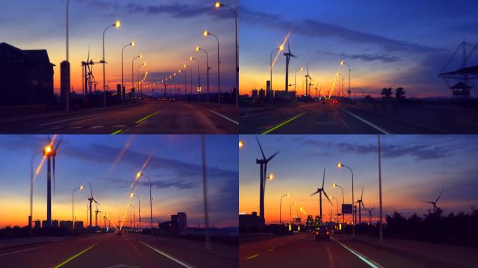 黄昏下的公路大风车