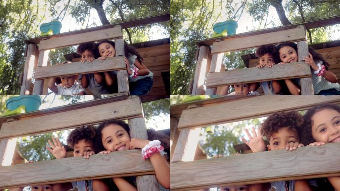 一群孩子在树屋里玩耍