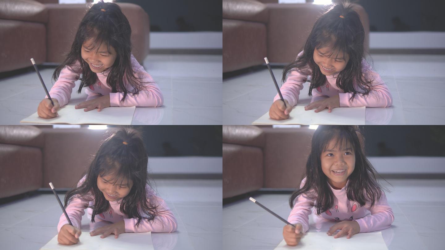 可爱的小女孩小朋友写作业在家里
