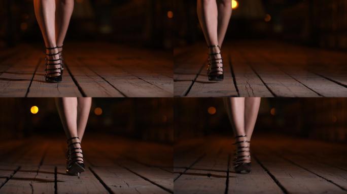 特写：穿着高跟鞋的人晚上在桥上行走