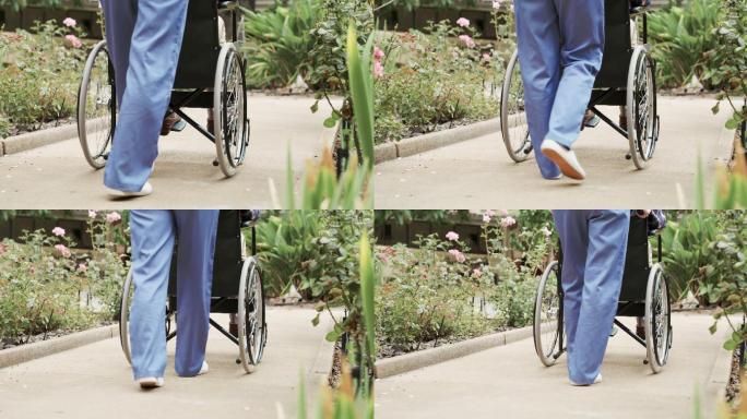护士推着轮椅上的老人散步