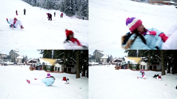 母亲和女儿在冬季滑雪中心玩雪橇