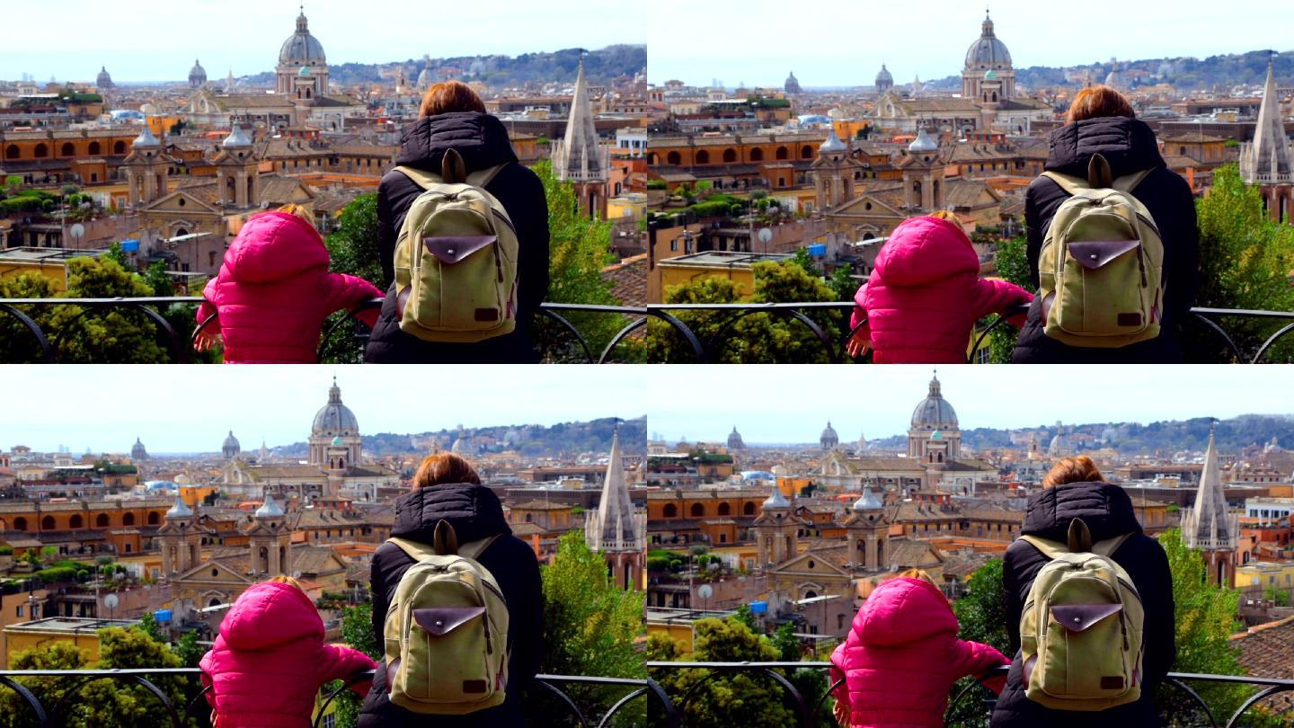 女人带着女儿欣赏美丽的罗马景色
