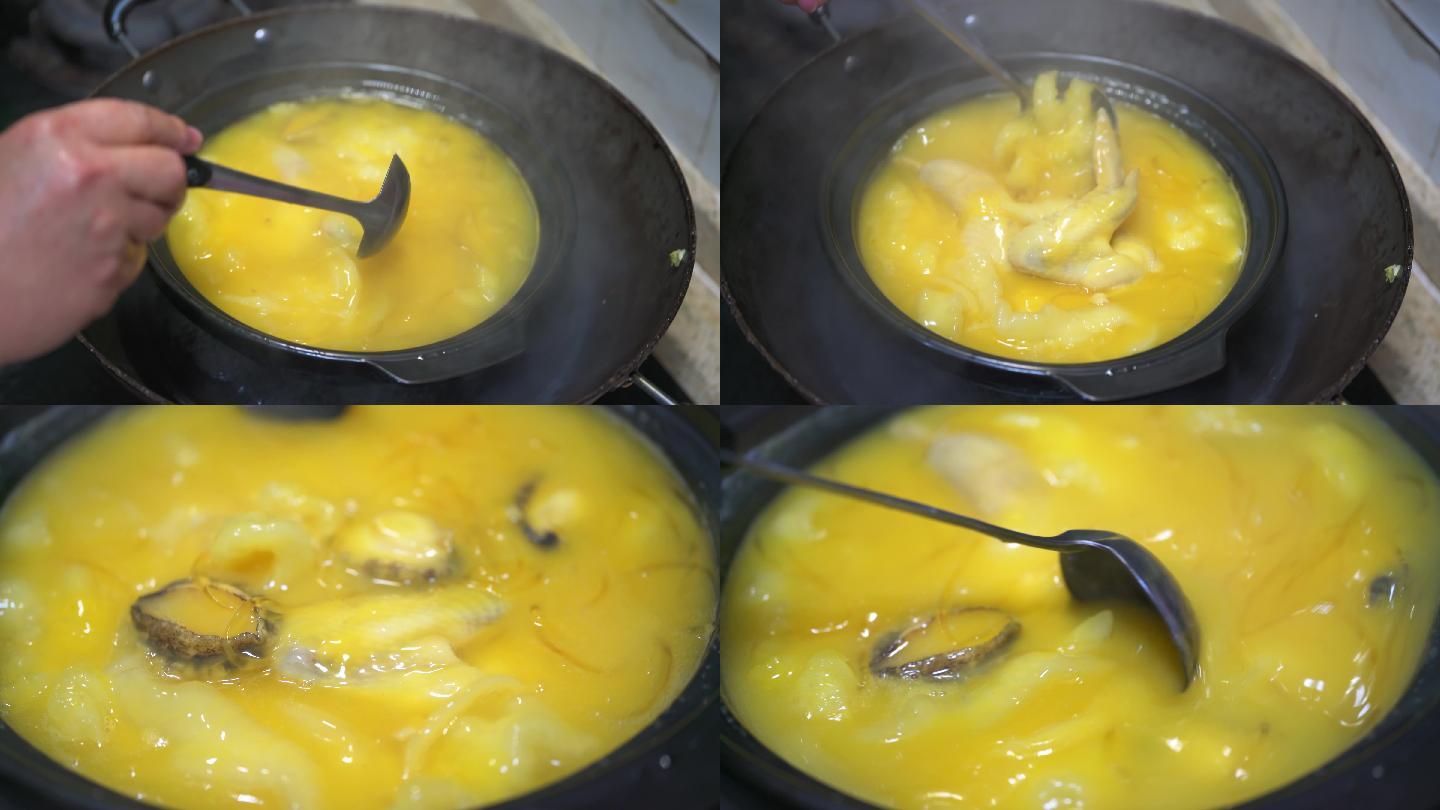 一位厨师在制作一锅金黄诱人的花胶炖鸡