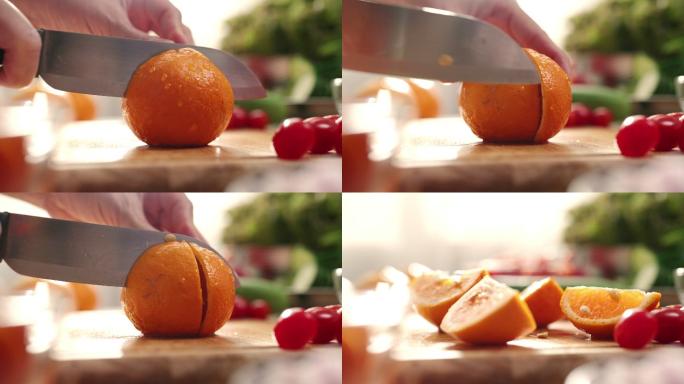 在砧板上切鲜橙切橙子高清慢动作