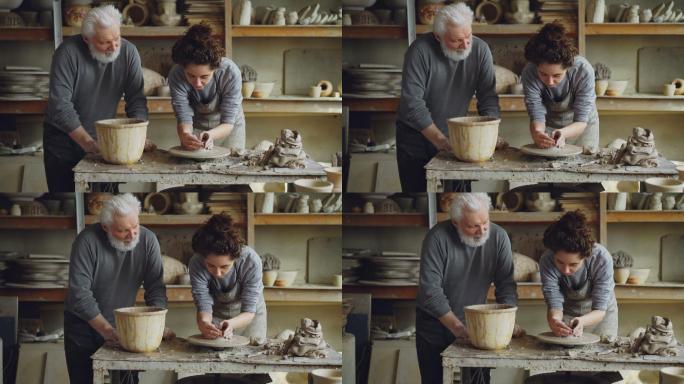 爷爷正在教年轻女孩做陶器手工。