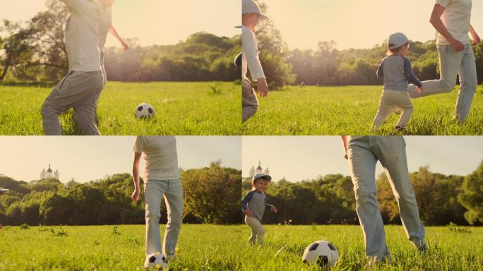 父亲和两个儿子在草地上踢足球