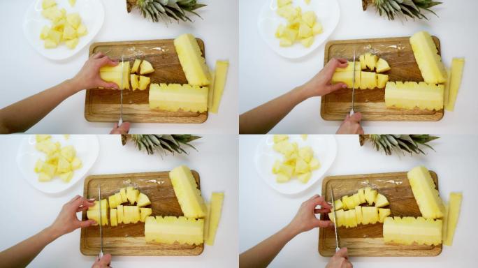 女人在木板上切菠萝