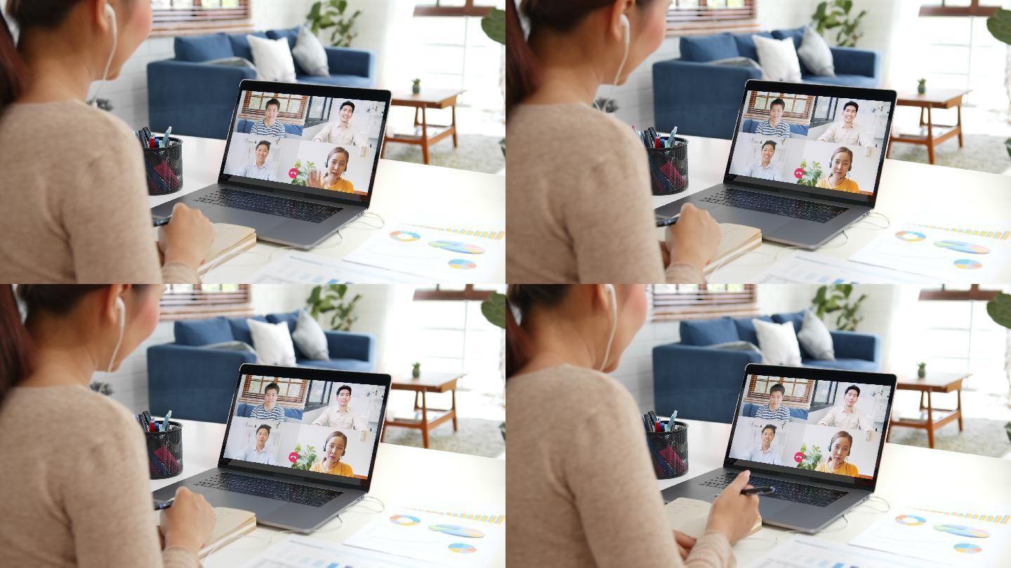 女商人在家工作，与同事进行虚拟视频会议