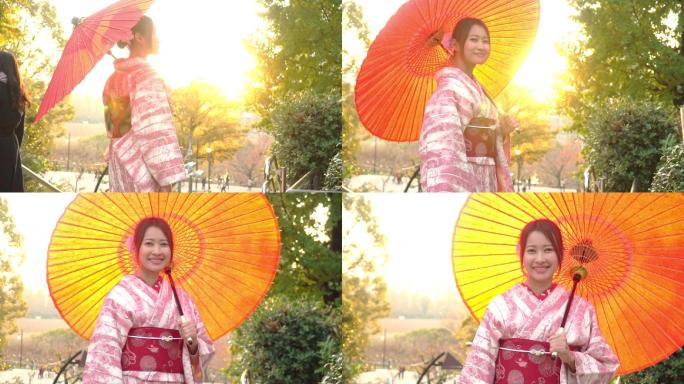 女性游客，穿着粉色传统日本和服