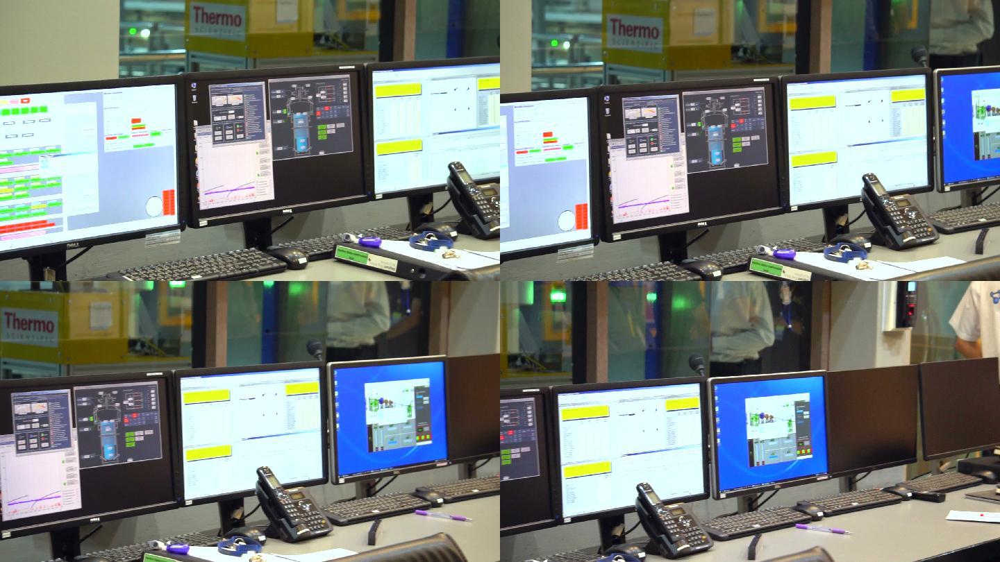 控制室的工程师监控数据监测电脑计算机