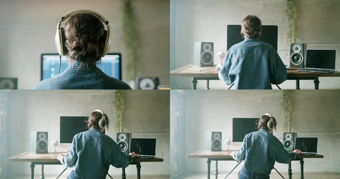女子在电脑前戴上耳机