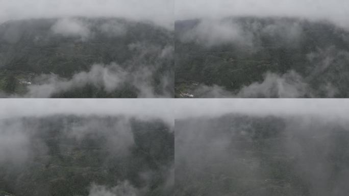 航拍雨天云海中的的金华北山观景台盘山公路