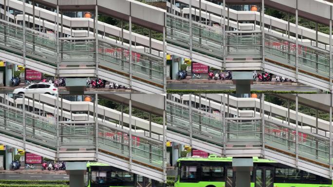 绿色公交车驶过乘客走出BRT车站