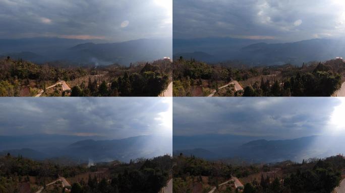 延时视频雾气笼罩的山乡村寨光影云层变化