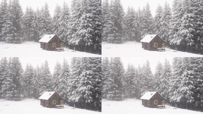 雪落在山林和小屋上