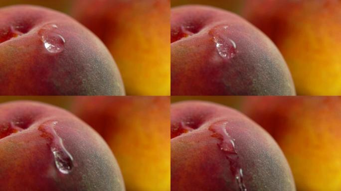 一滴水沿着桃子流下