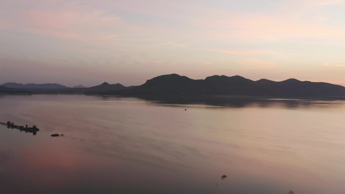 航拍山东省曲阜尼山圣境旅游区尼山湖风景