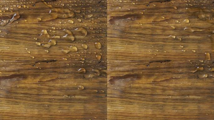 风吹过木板上的雨滴。