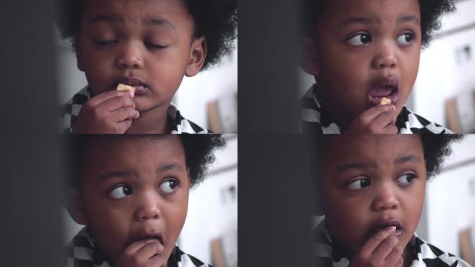小男孩吃饼干非洲小孩小孩子贫困人口