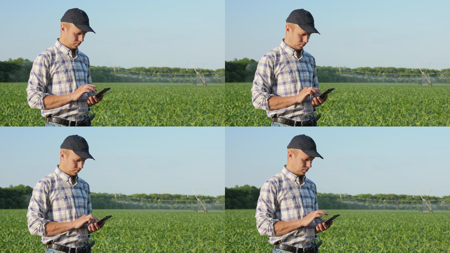 农夫在田间使用智能手机